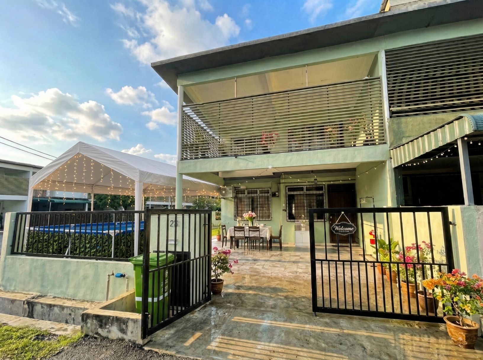 Mint-green front of Aydan Wonderland Homestay in Sungai Soi, Kuantan